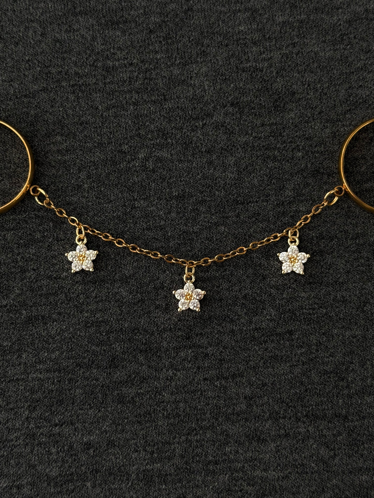 Double ring chain, gold buttercup flower