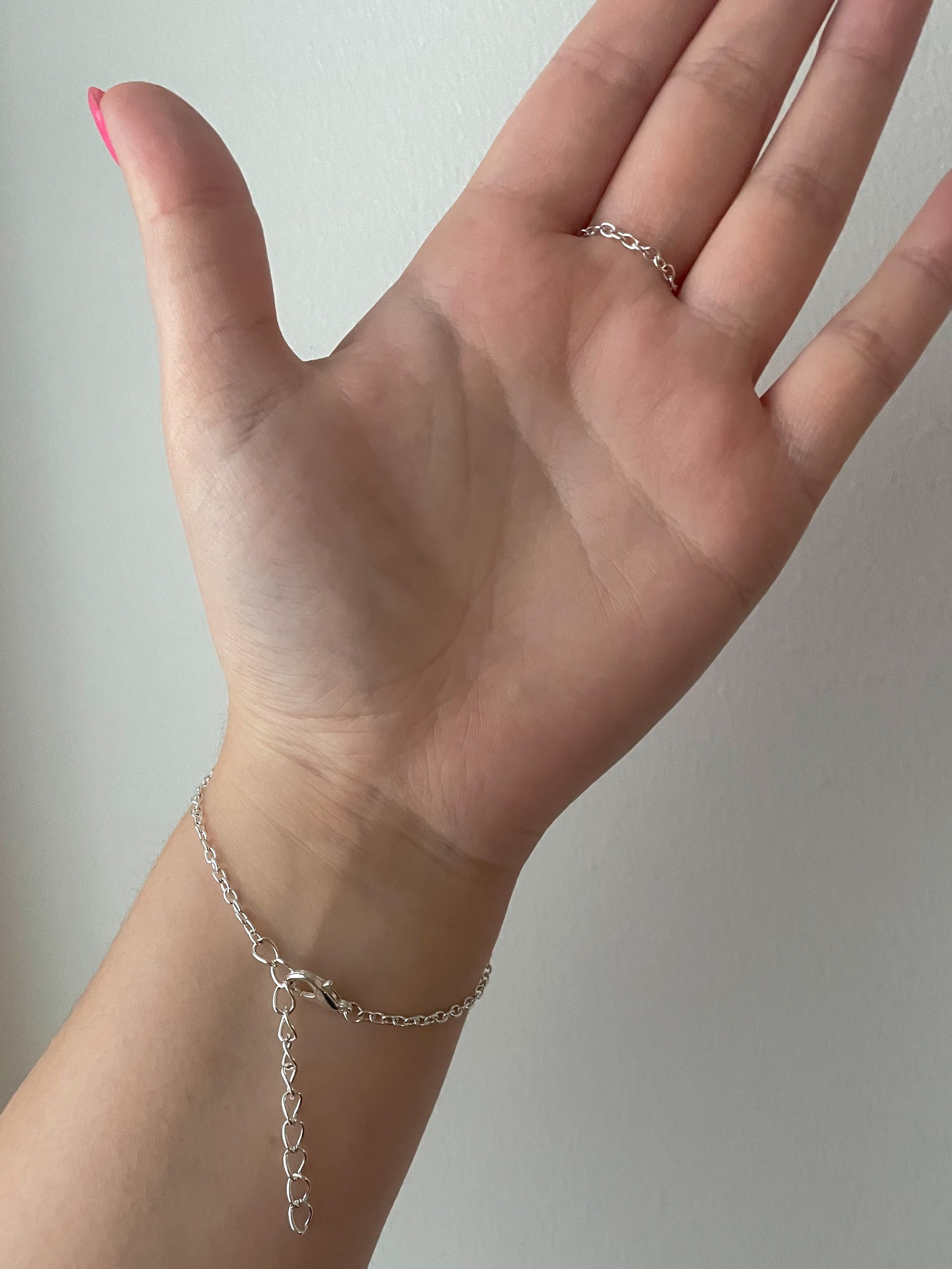 Acalla Jewellery, handmade Hand bracelet made of stainless steel and freshwater pearls 