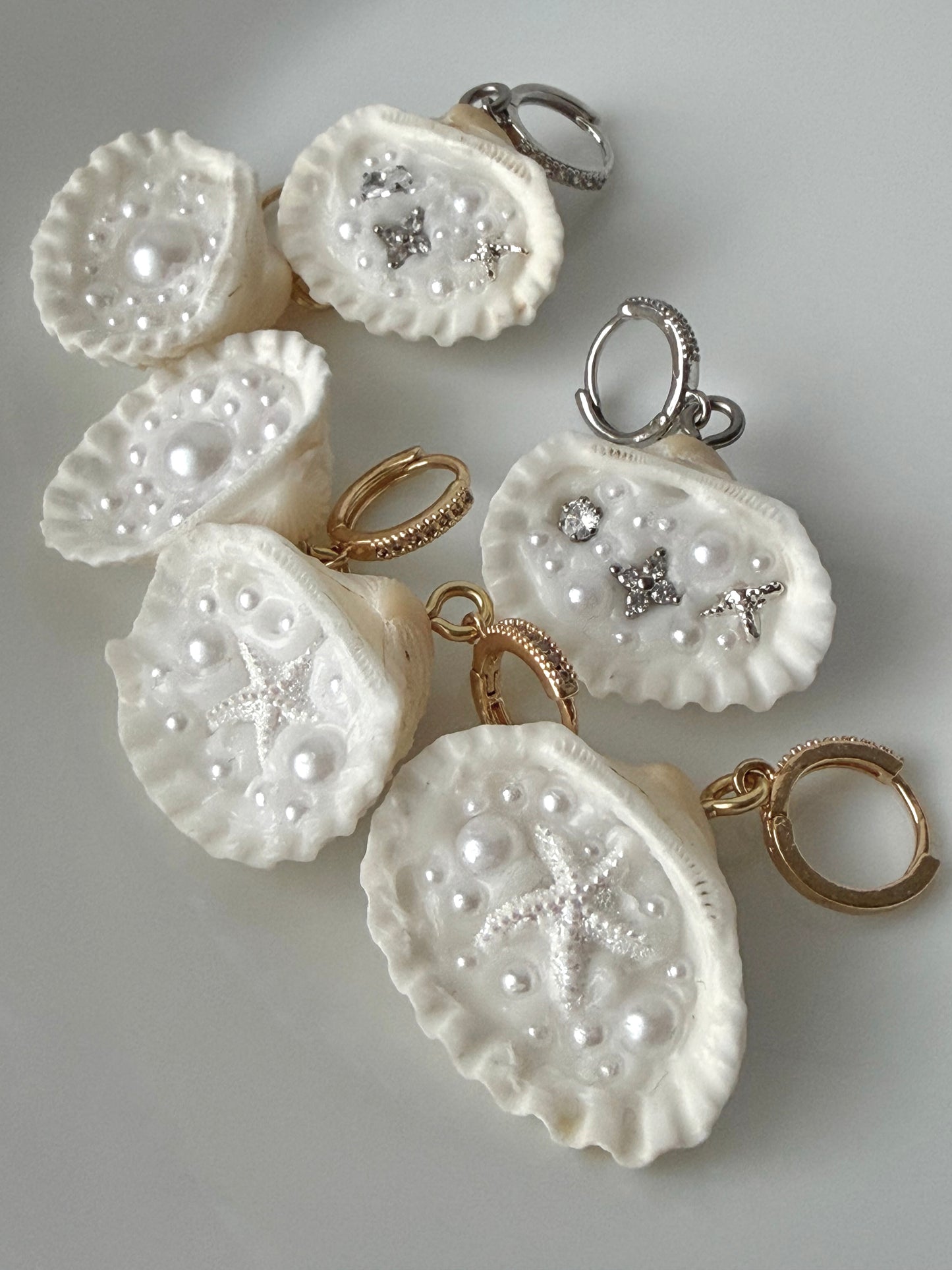 Tiny Treasure earrings | Starfish, gold/silver